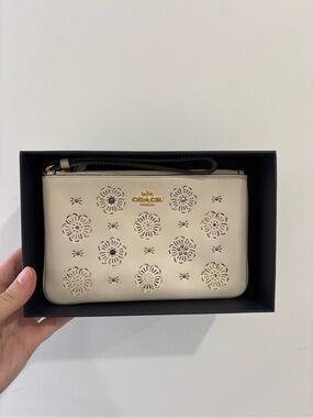 Coach Cream Floral Cutout Leather Wristlet